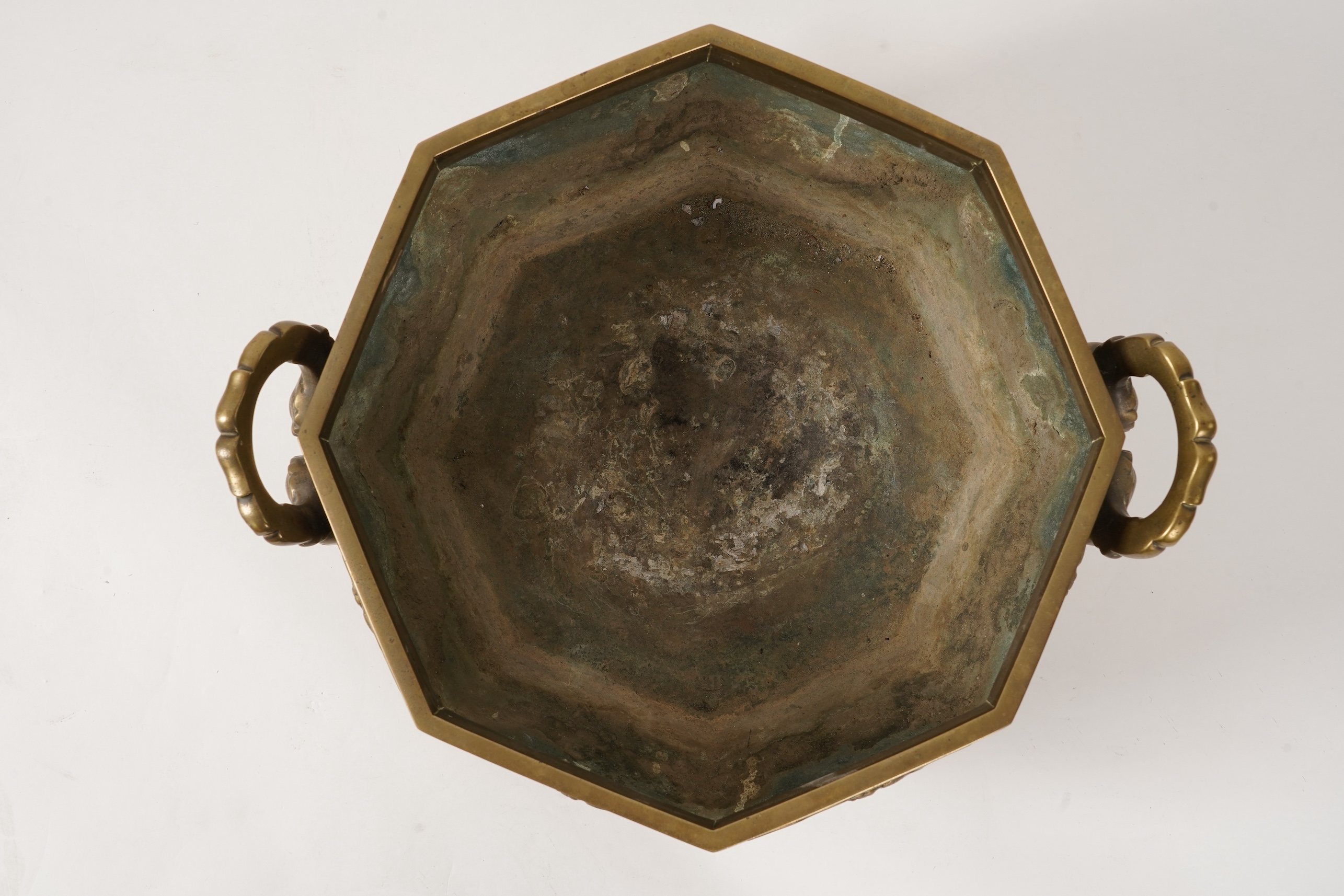 A large Chinese or Japanese bronze octagonal jardiniere, 19th century
